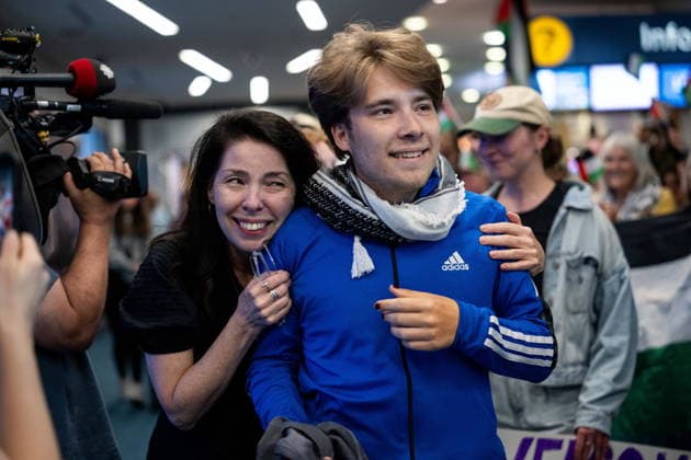 May 24, 2026, Vancouver, Bc, CANADA: Sebastian Tow, right, member of the Gaza flotilla, reunites with his mother Anita Wittenberg as he arrives at the Vancouver International Airport in Richmond B.C., on Sunday, May 24, 2026. Vancouver CANADA - ZUMAc35_ 20260524_zaf_c35_176 Copyright: xEthanxCairnsx