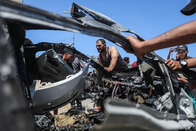 One person was killed in an Israeli attack on a car in Gaza, despite the ceasefire DEIR AL-BALAH, GAZA, PALESTINE - JUNE 02: Palestinians gather around a car that caught fire and became unusable after it was targeted by an Israeli unmanned aerial vehicle (UAV) in Deir al-Balah, Gaza, Palestine, on June 02, 2026. According to information received from health sources at Al-Aqsa Martyrs Hospital, Ahmed Khalid Abu Magasib (32), who was in the car targeted by the Israeli army near the Al-Mazraa School, lost his life. Moiz Salhi Anadolu Deir al-Balah Gaza. Editorial use only. Please get in touch for any other usage. Copyright: x2026xAnadoluxMoizxSalhix