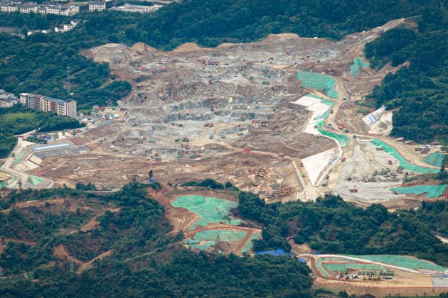 (260608) -- YICHANG, June 8, 2026 -- An aerial drone photo taken on June 8, 2026 shows the construction site of a new ship lock and its approach channels of the Three Gorges new waterway project in Yichang, central China s Hubei Province. China on Monday began construction of a mega waterway project, including what is expected to become the world s largest inland ship lock, in response to the rising shipping demand along the Yangtze, the world s third-longest river. The 77.2-billion-yuan (about 11.3 billion U.S. dollars) project will add a five-tier, dual-track ship lock north of the existing lock at the Three Gorges Dam, the world s largest water conservancy project, and upgrade navigation facilities at a smaller downstream dam. The