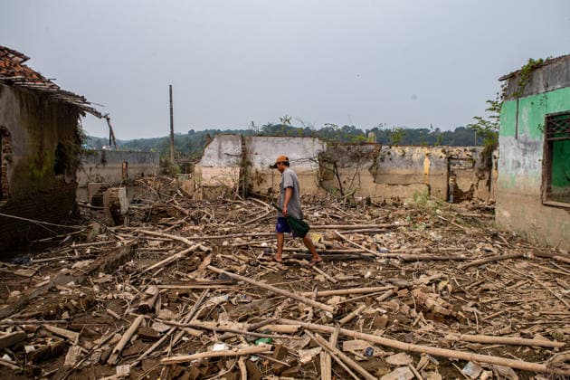 July 31, 2026, Lebak Regency, Banten, Indonesia: A man walks through the ruins of Somang village, which has re-emerged as water levels recede during the dry season, amid forecasts that El Nio±o may contribute to drier-than-normal conditions, at Karian Reservoir in Sajira district, Lebak Regency, Banten province, Indonesia, July 31, 2026. Lebak Regency Indonesia - ZUMAp283 20260731_zip_p283_014 Copyright: xClaudioxPramanax