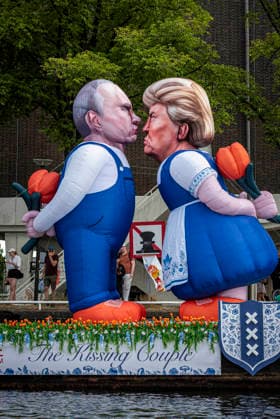 August 1, 2026, Amsterdam, North Holland, Netherlands: Two float balloons of Presidents Vladimir Putin and Donald Trump kiss as part of an Amsterdam Pride Canal Parade float. August 1, 2026, Amsterdam, the Netherlands. Hundreds of thousands of spectators joined the 30th edition of the Pride Canal Parade, the highlight of WorldPride Amsterdam 2026. This yearâ€⠢s parade also included the WorldPride Stadium grandstand, with seating for approximately 10,000 people to watch as floats pass. Amsterdam Netherlands - ZUMAp202 20260801_zip_p202_017 Copyright: xJamesxPetermeierx
