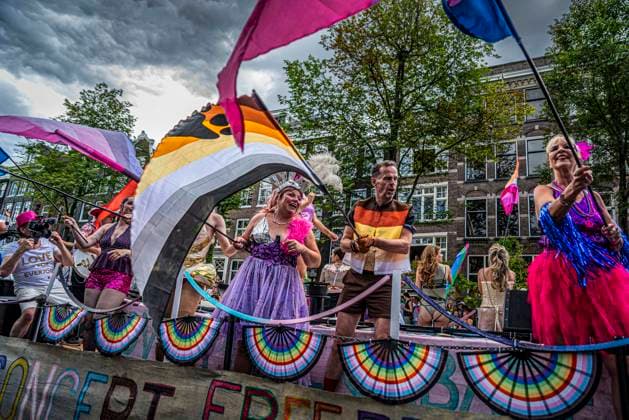August 1, 2026, Amsterdam, North Holland, Netherlands: August 1, 2026, Amsterdam, the Netherlands. Hundreds of thousands of spectators joined the 30th edition of the Pride Canal Parade, the highlight of WorldPride Amsterdam 2026. This yearâ€⠢s parade also included the WorldPride Stadium grandstand, with seating for approximately 10,000 people to watch as floats pass. Amsterdam Netherlands - ZUMAp202 20260801_zip_p202_051 Copyright: xJamesxPetermeierx