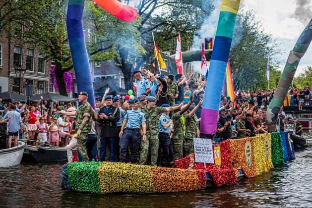 August 1, 2026, Amsterdam, North Holland, Netherlands: Members of the Dutch military join Amsterdam Pride s Canal Parade. August 1, 2026, Amsterdam, the Netherlands. Hundreds of thousands of spectators joined the 30th edition of the Pride Canal Parade, the highlight of WorldPride Amsterdam 2026. This yearâ€⠢s parade also included the WorldPride Stadium grandstand, with seating for approximately 10,000 people to watch as floats pass. Amsterdam Netherlands - ZUMAp202 20260801_zip_p202_058 Copyright: xJamesxPetermeierx