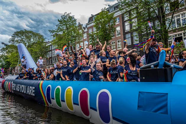 August 1, 2026, Amsterdam, North Holland, Netherlands: Delta and KLM Airlines workers join Amsterdam Pride s Canal Parade on August 1, 2026, in Amsterdam, the Netherlands. Hundreds of thousands of spectators joined the 30th edition of the Pride Canal Parade, the highlight of WorldPride Amsterdam 2026. This yearâ€⠢s parade also included the WorldPride Stadium grandstand, with seating for approximately 10,000 people to watch as floats pass by. Amsterdam Netherlands - ZUMAp202 20260801_zip_p202_084 Copyright: xJamesxPetermeierx