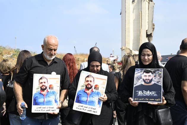 Memorial ceremony held in Lebanon to mark sixth anniversary of Beirut Port explosion BEIRUT, LEBANON - AUGUST 4: People attend a memorial ceremony held in front of the monument bearing the names of those killed in the Aug. 4, 2020 Beirut Port explosion, marking the sixth anniversary of the disaster while holding photos, in Beirut, Lebanon, on August 4, 2026. The ceremony was attended by families of the victims, Lebanese Justice Minister Adel Nassar, Information Minister Paul Markus, Social Affairs Minister Haneen El Sayed, ambassadors of several countries that lost citizens in the explosion, and other members of the diplomatic corps. Houssam Shbaro Anadolu Beirut Lebanon. Editorial use only. Please get in touch for any other usage. Copyright: x2026xAnadoluxHoussamxShbarox