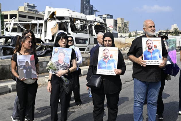 Memorial ceremony held in Lebanon to mark sixth anniversary of Beirut Port explosion BEIRUT, LEBANON - AUGUST 4: People attend a memorial ceremony held in front of the monument bearing the names of those killed in the Aug. 4, 2020 Beirut Port explosion, marking the sixth anniversary of the disaster while holding photos, in Beirut, Lebanon, on August 4, 2026. The ceremony was attended by families of the victims, Lebanese Justice Minister Adel Nassar, Information Minister Paul Markus, Social Affairs Minister Haneen El Sayed, ambassadors of several countries that lost citizens in the explosion, and other members of the diplomatic corps. Houssam Shbaro Anadolu Beirut Lebanon. Editorial use only. Please get in touch for any other usage. Copyright: x2026xAnadoluxHoussamxShbarox