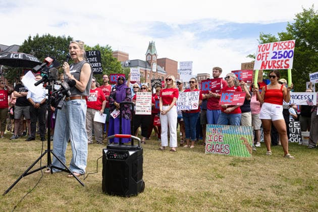August 5, 2026, Portland, Maine, USA: Members of the Maine State Nurses Association union protest federal Immigration and Customs Enforcement (ICE) on the lawn outside Maine Medical Center, the stateâ€⠢s largest hospital, on Wednesday morning, August 5, 2026. Nurses demanded the release of colleague and medical-surgical nurse, DEBORA KAPISHA, who was detained by federal officials at Logan Airport in Boston on July 30, 2026. Union members said KAPISHA, originally from Zambia, has federal authorization to work in Maine while awaiting the outcome of her asylum case. In addition to KAPISHAâ€⠢S release, union members demanded their employer, Maine Medical Center, take immediate steps to formally sponsor KAPISHA for permanent residency. - ZUMAb349 20260805_znp_b349_005 Copyright: xTroyxR.xBennettx