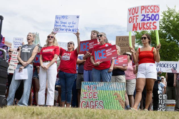 August 5, 2026, Portland, Maine, USA: Members of the Maine State Nurses Association union protest federal Immigration and Customs Enforcement (ICE) on the lawn outside Maine Medical Center, the stateâ€⠢s largest hospital, on Wednesday morning, August 5, 2026. Nurses demanded the release of colleague and medical-surgical nurse, DEBORA KAPISHA, who was detained by federal officials at Logan Airport in Boston on July 30, 2026. Union members said KAPISHA, originally from Zambia, has federal authorization to work in Maine while awaiting the outcome of her asylum case. In addition to KAPISHAâ€⠢S release, union members demanded their employer, Maine Medical Center, take immediate steps to formally sponsor KAPISHA for permanent residency. - ZUMAb349 20260805_znp_b349_012 Copyright: xTroyxR.xBennettx