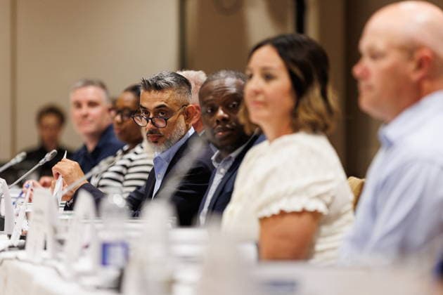August 10, 2026, Toronto, On, Canada: Jack Uppal, centre left, President and Managing Director, GM Canada sits alongside representatives from GM as Unifor opens negotiations with General Motors in Toronto, on Monday, Aug. 10, 2026. Toronto Canada - ZUMAc35_ 20260810_zaf_c35_012 Copyright: xKeitoxNewmanx