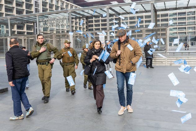 August 11, 2026, Santiago, Chile: Michael Clark (r) along with his lawyer, throw papers recreating a national bill with his face. The manager of Sartor Finance Group, and former president of azul-azul, Michael Clark, appears in the 4th local police court for formalization for his alleged link with the economic crimes of the so-called Sartor Case, which would be: disloyal administration, fraud, money laundering, fraud by omission, acquisition of shares and delivery of false information to the market. Santiago Chile - ZUMAs197 20260811_aaa_s197_108 Copyright: xSebastianxNancox