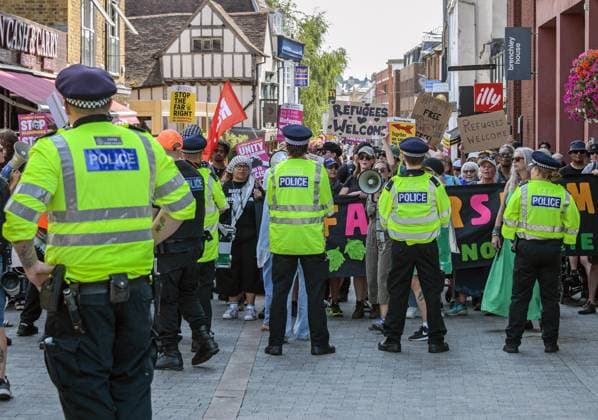Anti-immigration demonstrators and Stand Up to Racism counter-protesters rally in Maidstone MAIDSTONE, UNITED KINGDOM - AUGUST 15: Activists from Stand Up to Racism assemble outside County Hall in Maidstone, Kent, United Kingdom, on August 15, 2026, to counter-protest against the far-right Kent Nationalist Movement as they gathered before marching through the town center. While the far-right group voiced opposition to government border policies, asylum seeker housing programs, and mass migration, Stand Up to Racism demonstrators chanted slogans and displayed placards to denounce far-right activity and express solidarity with refugees, with police officers maintaining a presence to keep the opposing groups separated. Stuart Brock Anadolu M Copyright: x2026xAnadoluxStuartxBrockx