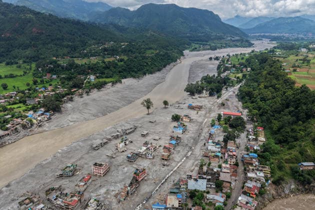 Deaths, missing numbers rise amid aftermath of Nepal-China flash floods DEVIGHAT, NEPAL - AUGUST 29: An aerial photo shows houses at a town along the Trishuli River destroyed by the flash floods, amid increasing deaths and missing people, in Devighat, Nuwakot, Nepal, on August 29, 2026. More than 2,000 people remain missing while hundreds of people have died, following the flash flood and landslide near the Nepal-China border earlier. Among the missing foreign nationals include those from China, India, the United States, Australia, the United Kingdom and South Korea. Daniel Ceng Anadolu Devighat Nepal. Editorial use only. Please get in touch for any other usage. Copyright: x2026xAnadoluxDanielxCengx