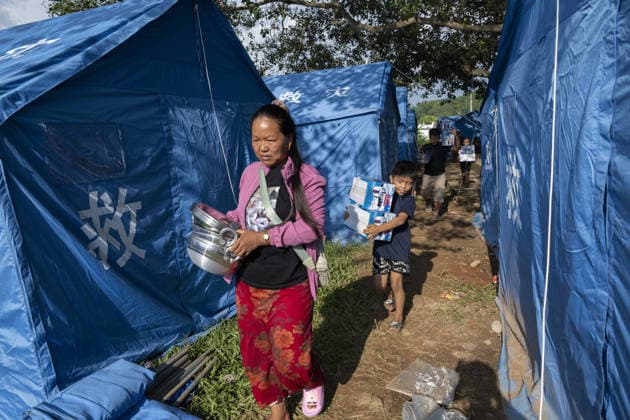 Temporary shelters provide aid to Nepal flood victims DEVIGHAT, NUWAKOT, NEPAL - SEPTEMBER 15: Nepal government and various non-governmental organizations provide temporary shelters and assistance to families affected by the devastating flash floods that struck Nepal on August 26, in Devighat Dham, Nuwakot, Nepal, on September 15, 2026. Several temporary shelters are set up along the Galchi-Trishuli-Rasuwagadhi road in Nuwakot, where various organizations and individuals provide food, cooking supplies and other essential items to affected families. A Nepali citizen who arrives from Australia donates shoes to children from affected families, while various toys, including colorful dolls, are also provided for children staying at the shelters. Copyright: x2026xAnadoluxAbdulxGonix
