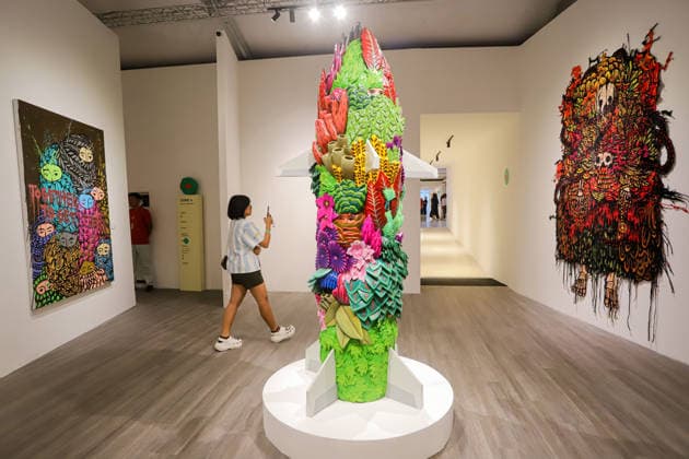 September 20, 2026, Surabaya, East Java, Indonesia: A visitor takes a photo of a contemporary artwork at the ArtSubs 2026 exhibition at Balai Pemuda, Surabaya, East Java, Indonesia, on September 20, 2026. Titled border, threshold, beyond, the art exhibition features 500 works by 113 artists from across Indonesia, serving as a response to the public s need for a space of contemplation, reflection, and entertainment. Surabaya Indonesia - ZUMAp290 20260920_zip_p290_002 Copyright: xRendyxAgungxPrakosox