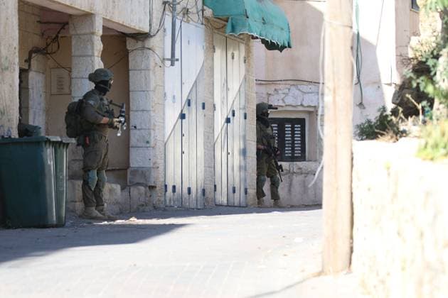Israeli Forces Started Large-Scale Military Operation In Biddu BIDU, PALESTINE SEPTEMBER 21, 2026: Israeli forces continued a large-scale military operation in the town of Biddu, northwest of occupied Jerusalem, with raids on homes, searches, arrests and field interrogations. The operation began at around 1:00 AM, according to local sources. Israeli forces raided the home of a Palestinian man accused of carrying out the Nabi Saleh attack, taking measurements and digging into parts of the walls in preparation for a possible demolition or explosion, according to local reports. His family home was also raided, and his father and other family members were detained. Israeli forces also seized a house belonging to a resident and converted it Copyright: x xSalmanxMohsenxAlkhatibx xJNAxPressx