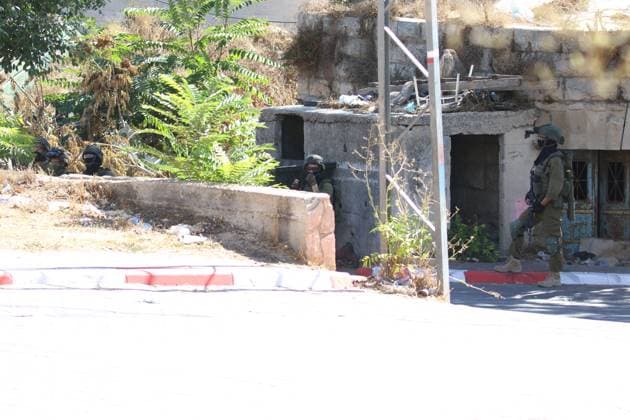 Israeli Forces Started Large-Scale Military Operation In Biddu BIDU, PALESTINE SEPTEMBER 21, 2026: Israeli forces continued a large-scale military operation in the town of Biddu, northwest of occupied Jerusalem, with raids on homes, searches, arrests and field interrogations. The operation began at around 1:00 AM, according to local sources. Israeli forces raided the home of a Palestinian man accused of carrying out the Nabi Saleh attack, taking measurements and digging into parts of the walls in preparation for a possible demolition or explosion, according to local reports. His family home was also raided, and his father and other family members were detained. Israeli forces also seized a house belonging to a resident and converted it Copyright: x xSalmanxMohsenxAlkhatibx xJNAxPressx