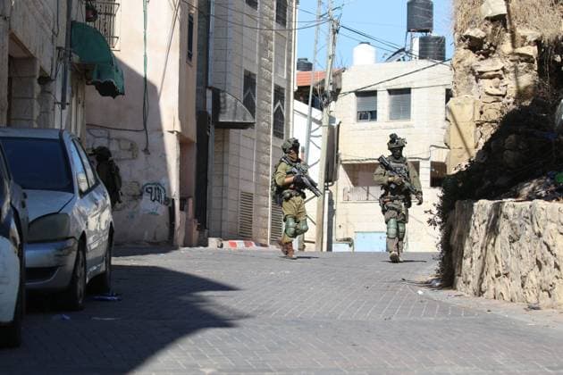 Israeli Forces Started Large-Scale Military Operation In Biddu BIDU, PALESTINE SEPTEMBER 21, 2026: Israeli forces continued a large-scale military operation in the town of Biddu, northwest of occupied Jerusalem, with raids on homes, searches, arrests and field interrogations. The operation began at around 1:00 AM, according to local sources. Israeli forces raided the home of a Palestinian man accused of carrying out the Nabi Saleh attack, taking measurements and digging into parts of the walls in preparation for a possible demolition or explosion, according to local reports. His family home was also raided, and his father and other family members were detained. Israeli forces also seized a house belonging to a resident and converted it Copyright: x xSalmanxMohsenxAlkhatibx xJNAxPressx