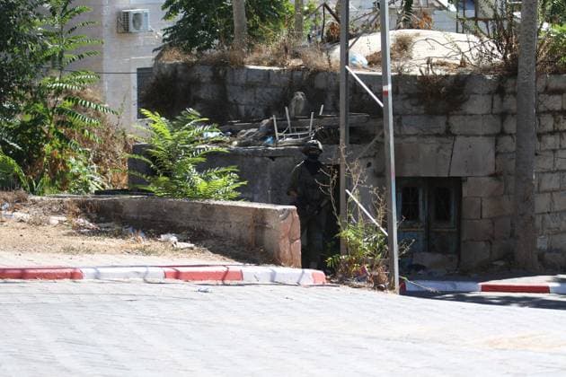 Israeli Forces Started Large-Scale Military Operation In Biddu BIDU, PALESTINE SEPTEMBER 21, 2026: Israeli forces continued a large-scale military operation in the town of Biddu, northwest of occupied Jerusalem, with raids on homes, searches, arrests and field interrogations. The operation began at around 1:00 AM, according to local sources. Israeli forces raided the home of a Palestinian man accused of carrying out the Nabi Saleh attack, taking measurements and digging into parts of the walls in preparation for a possible demolition or explosion, according to local reports. His family home was also raided, and his father and other family members were detained. Israeli forces also seized a house belonging to a resident and converted it Copyright: x xSalmanxMohsenxAlkhatibx xJNAxPressx