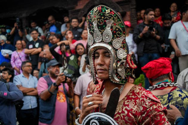 Indra Jatra Festival Started - Kathmandu Devotees perform a traditional God Dance as the sacred ceremonial wooden pole known as Ya: Shi is erected at Hanuman Dhoka Durbar Square, marking the beginning of the eight-day Indra Jatra festival in Kathmandu, Nepal, on September 23, 2026. The annual festival, one of the biggest celebrations in the Kathmandu Valley, is dedicated to Indra, the Hindu god of rain and heaven, and features traditional chariot processions, masked dances, religious rituals and cultural performances. The festival also includes processions of the living goddess Kumari through the historic streets of Kathmandu. Photo by Sunil Pradhan ABACAPRESS.COM Kathmandu Bagmati Nepal Copyright: xSuniixPradhan ABACAx