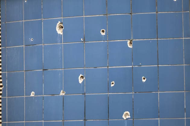 Shrapnel holes dot the exterior cladding of the Consultative and Diagnostic Centre in the Podilskyi district, damaged by an overnight Russian attack, Kyiv, Ukraine, September 24, 2026. On Thursday night, September 24, Russian forces launched a ballistic missile strike on Kyiv, followed by drone assaults on the capital and region. By morning, two people were confirmed killed and eight injured. The attack caused fires and destruction across several districts, damaging medical facilities, apartment blocks, private homes, and vehicles. The maternity hospital in the Podilskyi district sustained damage to windows, doors, and parts of the facade from the first to fifth floors, as well as to windows in the laundry and boiler rooms. Patients, childr Copyright: xPavloxBahmutx