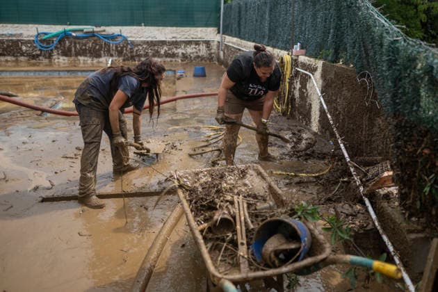 Heavy rains in Catalonia leave two dead and the Besòs River at risk of flooding. Residents clean up the mud that has accumulated in the streets and homes due to the torrential rains, on October 4, 2026, in Montornès del Vallès, Barcelona, Catalonia, Spain. The storm hitting Catalonia has left two people dead in the region. The president of the Generalitat, Salvador Illa, reported the death in Tordera of a 75-year-old man, who was at a campground when a wall reportedly collapsed on him. The second victim is a person who had been reported missing and was found in Montornès del Vallès. Emergency services are searching for another missing person in Riera de Pineda de Mar. The rains and storms have put eleven autonomous communities on alert thi Copyright: xLorenaxSopênax 7820138