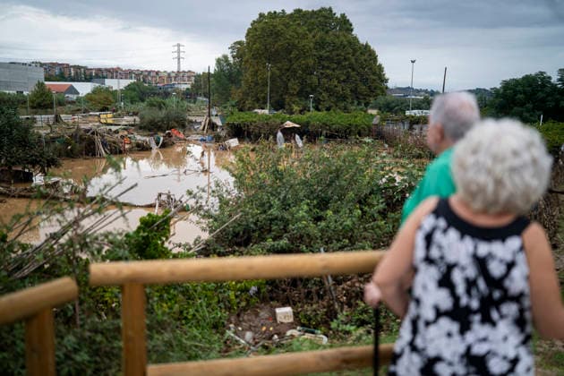 Heavy rains in Catalonia leave two dead and the Besòs River at risk of flooding Two people look at the mud and standing water caused by the torrential rains on October 4, 2026, in Montornès del Vallès, Barcelona, Catalonia, Spain. The storm hitting Catalonia has left two people dead in the region. The president of the Generalitat, Salvador Illa, reported the death in Tordera of a 75-year-old man, who was at a campground when a wall reportedly collapsed on him. The second victim is a person who had been reported missing and was found in Montornès del Vallès. Emergency services are searching for another missing person in Riera de Pineda de Mar. The rains and storms have put eleven autonomous communities on alert this Sunday in Spain, includi Copyright: xLorenaxSopênax 7820143
