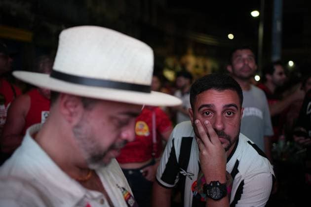 October 4, 2026, Rio De Janeiro, Brazil: RIO DE JANEIRO, BRAZIL, OCTOBER 4, 2026: Supporters of Brazilian President Luiz Inacio Lula da Silva gather in Rio de Janeiro to follow the results of the first round of Brazil s presidential election. Senator Flavio Bolsonaro finished first with 47.03 percent of valid votes, while Lula received 45.16 percent, sending the presidential race to a runoff after neither candidate secured an outright majority. The second round is scheduled for October 25 Rio De Janeiro Brazil - ZUMAq101 20261004_zna_q101_174 Copyright: xMarianaxGreifx