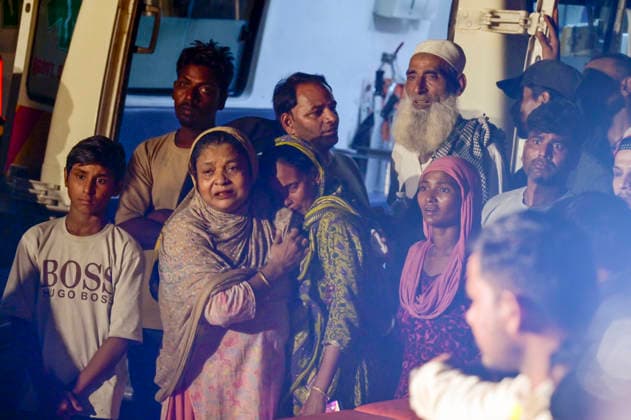 NEW DELHI, INDIA - OCTOBER 7: Mourning family members gather at the site where rescue operations are underway after a four-storey residential building collapsed in the New Seemapuri area of Shahdara on October 7, 2026, in New Delhi, India. The structural collapse occurred around 3:30 PM behind the local fish market, trapping multiple residents under concrete slabs and damaging two adjoining houses. At least one minor died while eight people were rescued and rushed to Rajiv Gandhi Super Speciality Hospital for emergency medical treatment as sniffer dogs and excavators worked late into the evening to locate remaining trapped survivors. (Photo by Raj K Raj Hindustan Times) 3 Dead, Eight Injured In 5 Storey Building Collapses In New Seemapuri O