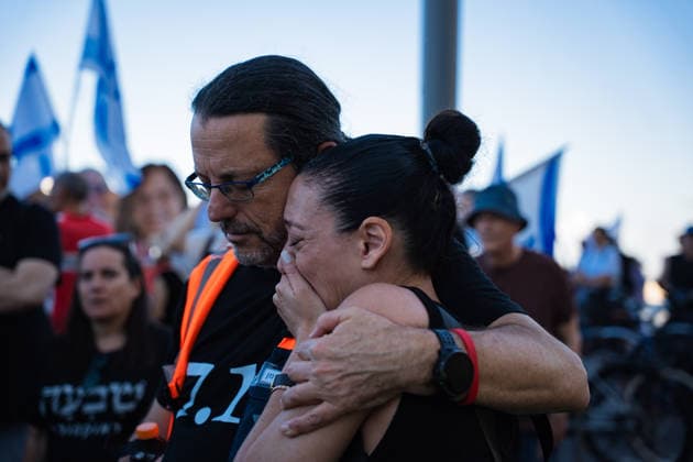 October 7, 2026, Tel Aviv, Tel Aviv, Israel: A protester comforts a tearful woman at a protest blaming the Israeli government for responsibility for October 7th on the third anniversary of the massacre. Tel Aviv Israel - ZUMAg280 20261007_znp_g280_004 Copyright: xYoavxGinsburgx
