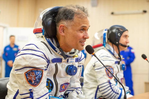 October 8, 2026, Baikonur, Kazakhstan: Baikonur, Kazakhstan. 14 July, 2026. NASA astronaut Anil Menon, left, and Roscosmos cosmonaut Pyotr Dubrov talk to family and friends after Sokol suit pressure checks at the Baikonur Cosmodrome, July 14, 2026 in Baikonur, Kazakhstan. The crew launched to the International Space Station later that day. Baikonur Kazakhstan - ZUMAp138 20261008_zaa_p138_033 Copyright: xPavelxShvets Gctcx