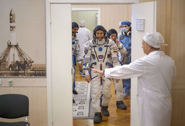 October 8, 2026, Baikonur, Kazakhstan: Baikonur, Kazakhstan. 14 July, 2026. NASA astronaut Anil Menon, left, and Roscosmos cosmonauts Pyotr Dubrov and Anna Kikina prepare for Sokol suit pressure checks at the Baikonur Cosmodrome, July 14, 2026 in Baikonur, Kazakhstan. The crew launched to the International Space Station later that day. Baikonur Kazakhstan - ZUMAp138 20261008_zaa_p138_057 Copyright: xBillxIngalls Nasax