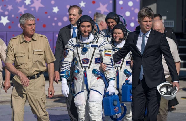 October 8, 2026, Baikonur, Kazakhstan: Baikonur, Kazakhstan. 14 July, 2026. Roscosmos cosmonaut Pyotr Dubrov walks with Sergei Krikalev, left, and Roscosmos Director General Dmitry Bakanov to board the Soyuz MS-29 spacecraft at the Baikonur Cosmodrome, July 14, 2026 in Baikonur, Kazakhstan. Dubrov launched to the International Space Station with Anil Menon and Anna Kikina. Baikonur Kazakhstan - ZUMAp138 20261008_zaa_p138_065 Copyright: xBillxIngalls Nasax
