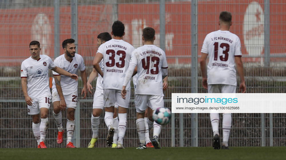 Jubel nach dem Tor zum 2:2, jubelnd, bejubelt, jubelt, jubeln, emotionen um den Torschuetzen Fabian Schleusener (1.FC Nuernberg) 2. v. li., 25.03.2021 - Fussball - Saison 2020 2021 - Testspiel Freundschaftsspiel: FSV Mainz 05 - 1. FC Nürnberg FCN - HMB -