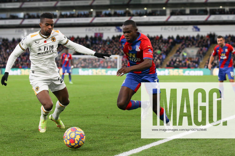 Tyrick Mitchell of Crystal Palace takes on NŽlson Semedo of Wolverhampton Wanderers during the Premier League match between Crystal Palace and Wolverhampton Wanderers at Selhurst Park, London, England on 6 November 2021.