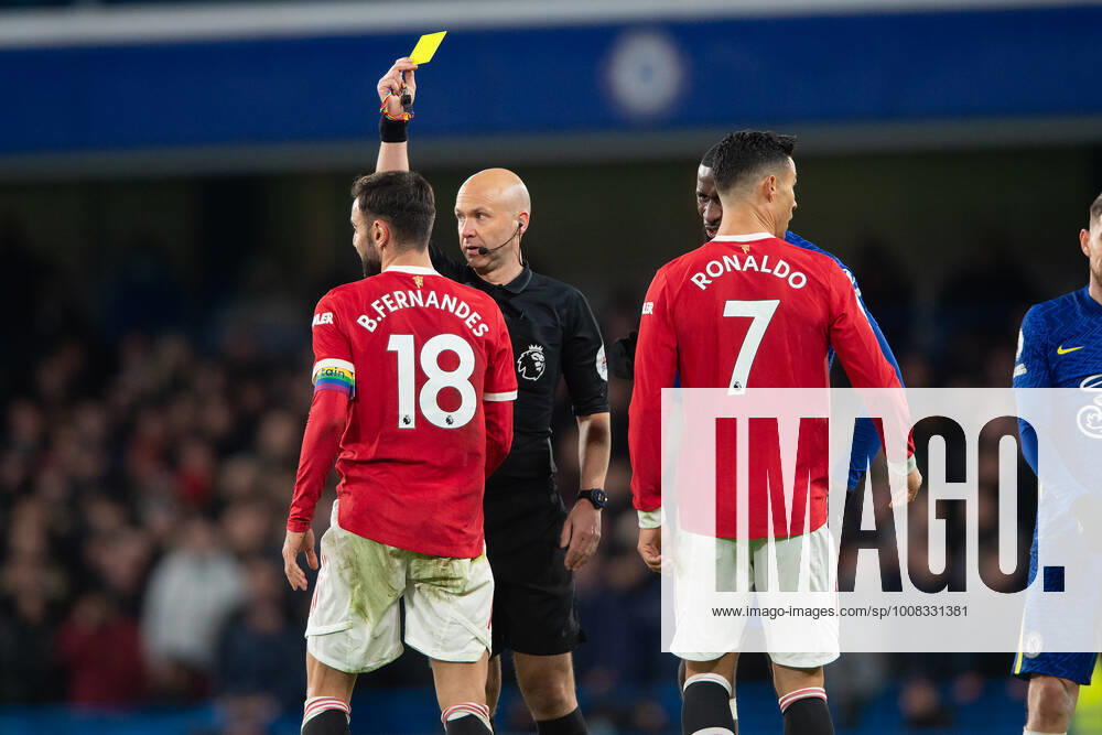 Bruno Fernandes of Manchester United, ManU receives a yellow card during the Premier League match between Chelsea and Manchester United at Stamford Bridge, London, England on 28 November 2021.
