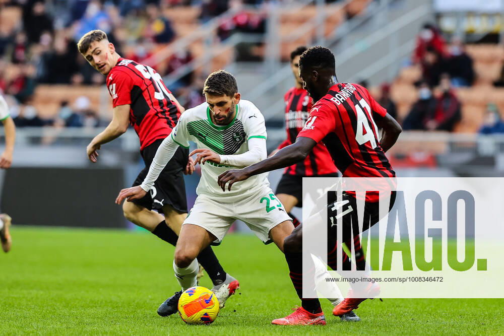 Domenico Berardi of US Sassuolo in action during the Serie A 2021 22 football match between AC Milan and US Sassuolo at Giuseppe Meazza Stadium, Milan, Italy on November 28, 2021 - Milan Stadio San Siro Milan Italy