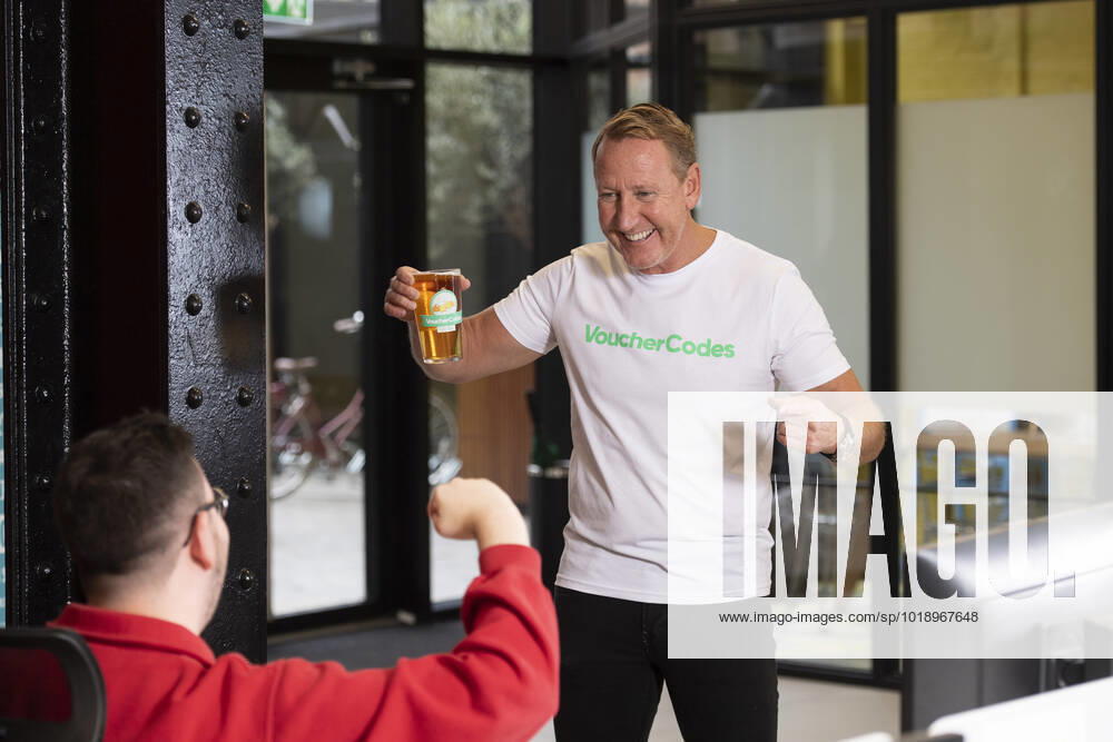 London, United Kingdom. Former England midfielder, Ray Parlour, launches the VoucherCodes On Tap service, delivering beer to fans at their place of work, so they can sip on a beer as they enjoy Englands opening fixture against Iran.