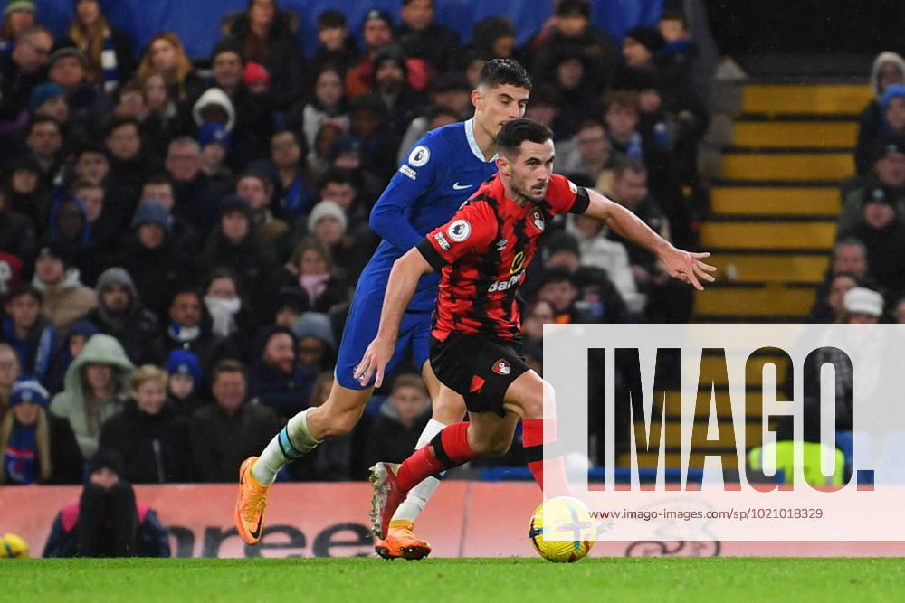 Chelsea v Bournemouth Premier League 27 12 2022. AFC Bournemouth midfielder Lewis Cook (4) on the ball under pressure from Chelsea midfielder Kai Havertz (29) during the Premier League match between Chelsea and Bournemouth at Stamford Bridge, London, England on 27 December 2022. London Stamford Bridge Greater London England Editorial use only DataCo restrictions apply See www.football-dataco.com ,