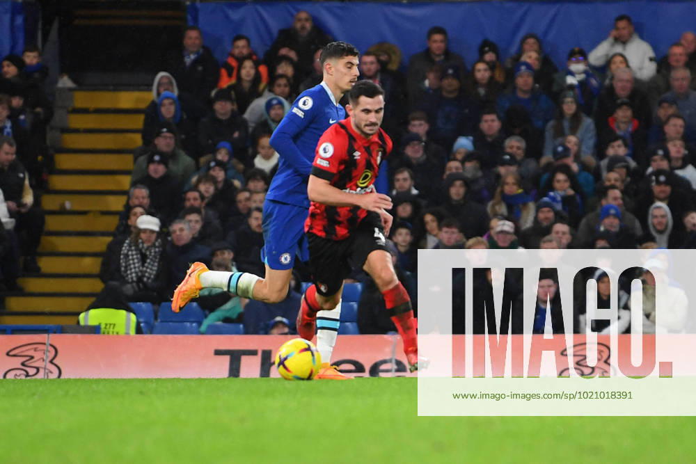 Chelsea v Bournemouth Premier League 27 12 2022. AFC Bournemouth midfielder Lewis Cook (4) on the ball under pressure from Chelsea midfielder Kai Havertz (29) during the Premier League match between Chelsea and Bournemouth at Stamford Bridge, London, England on 27 December 2022. London Stamford Bridge Greater London England Editorial use only DataCo restrictions apply See www.football-dataco.com ,