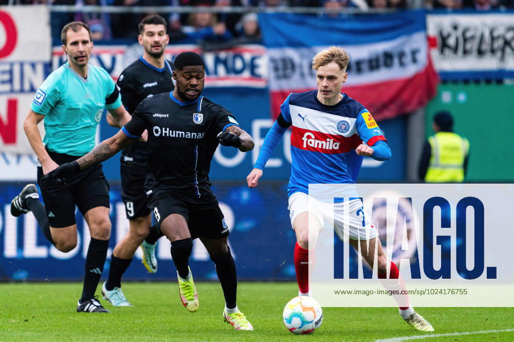 Moritz-Broni Kwarteng (1. FC Magdeburg 8) foult Finn Porath (Holstein Kiel 27) Holstein Kiel vs. 1. FC Magdeburg, Fussball, 2. Bundesliga, Spieltag 20, Saison 2022 23, 11.02.2023 DFL REGULATIONS PROHIBIT ANY USE OF PHOTOGRAPHS AS IMAGE SEQUENCES AND OR QUASI-VIDEO -Pressefoto Marcel von Fehrn Holstein Kiel vs. 1. FC Magdeburg, Fussball, 2. Bundesliga, Spieltag 20, Saison 2022 23, 11.02.2023 Kiel