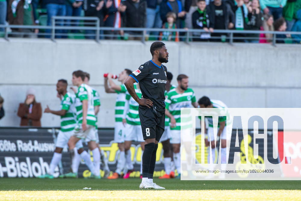 Moritz-Broni Kwarteng (1. FC Magdeburg, 8) aergert sich, die Fuerther um Julian Green (SpVgg Greuther Fuerth, 37)jubeln ueber das Tor zum 1:0, GER, SpVgg Greuther Fuerth vs. 1. FC Magdeburg, Fussball, 2. Bundesliga, 25. Spieltag, Spielzeit 2022 2023, 18.03.2023 DFB DFL regulations prohibit any use of photographs as image sequences and or quasi-video GER, SpVgg Greuther Fuerth vs. 1. FC Magdeburg, Fussball, 2. Bundesliga, 25. Spieltag, Spielzeit 2022 2023, 18.03.2023 Fuerth