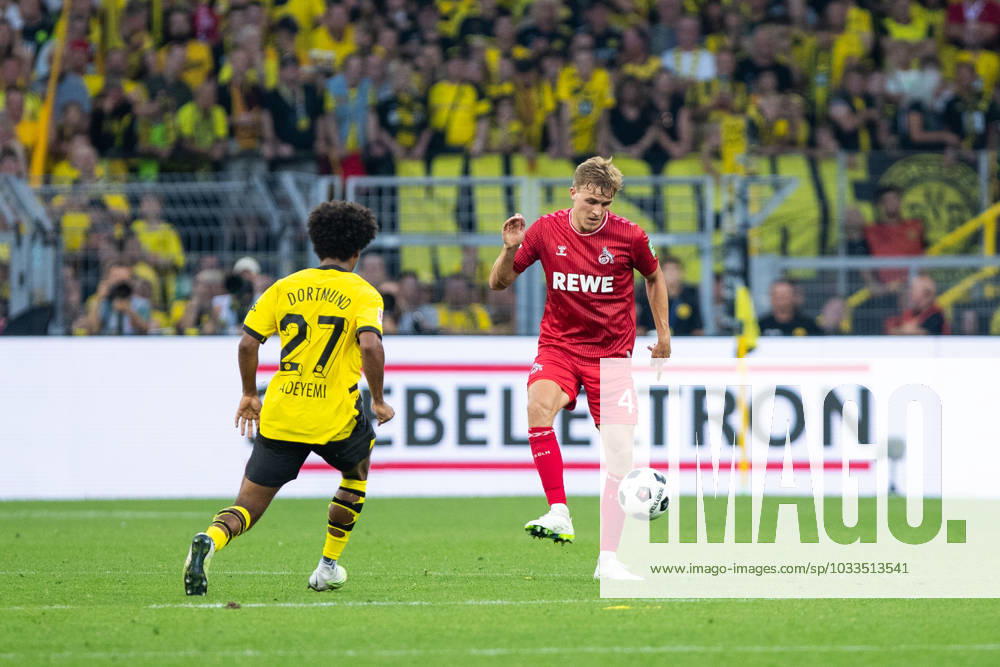 1.Bundesliga, 1.Spieltag: Borussia Dortmund - 1.FC Koeln, Dortmund, Signal Iduna Park, 19.08.2023 Timo Huebers (1. FC Koeln, 4), Karim Adeyemi (Borussia Dortmund, 27) 1.Bundesliga, 1.Spieltag: Borussia Dortmund - 1.FC Koeln, Dortmund, Signal Iduna Park, 19.08.2023 DFL Regulations prohibit any of use of photographs as image sequences and quasi video