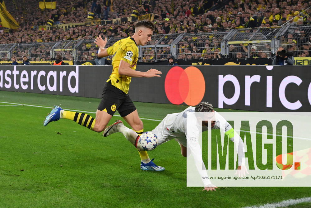 Nico Schlotterbeck (Borussia Dortmund), li., gegen Theo Hernandez (AC Mailand) 04.10.2023, Fussball Champions League, Saison 2023 2024, Vorrunde, 2. Spieltag, Borussia Dortmund - AC Mailand Dortmund Signal Iduna Park Nordrhein Westfalen Deutschland