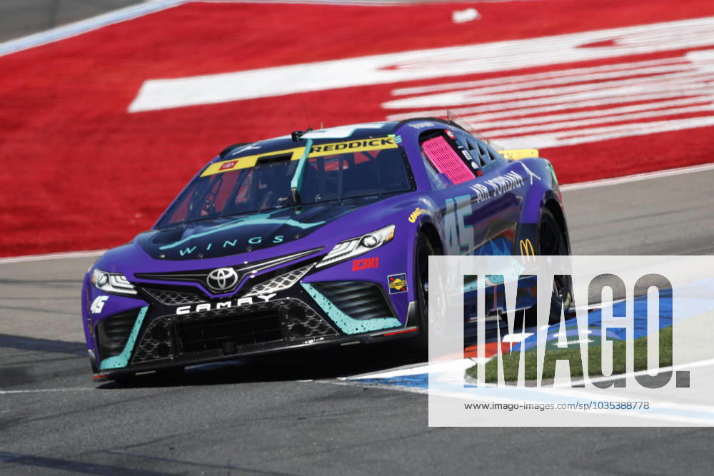 CHARLOTTE, NC - OCTOBER 08: Tyler Reddick ( 45 23XI Racing Jordan Brand Toyota) exits turn 18 during the running of the NASCAR, Motorsport, USA Cup Series Playoff Bank of America ROVAL 400 on October 8, 2023, at Charlotte Motor Speedway in Charlotte, NC. (Photo by Jeff Robinson Icon Sportswire) AUTO: OCT 08 NASCAR Cup Series Playoff Bank of America ROVAL 400 Icon231008922400