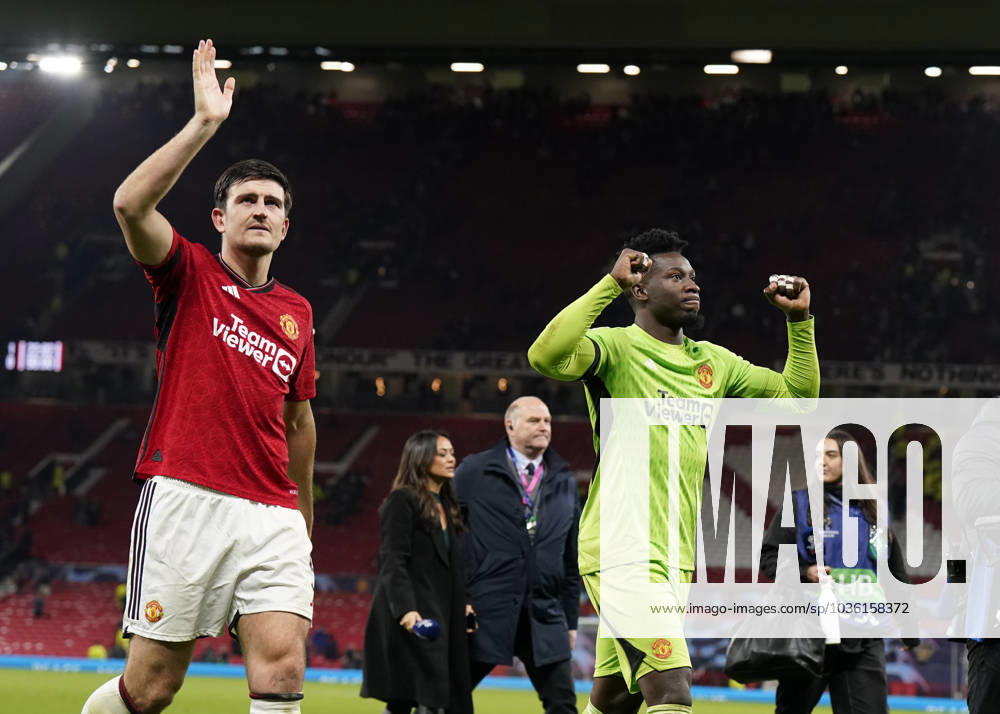 Manchester, England, 24th October 2023. Harry Maguire of Manchester United, ManU and Andrà Onana of Manchester United take the acclaim during the UEFA Champions League match at Old Trafford, Manchester. Picture credit should read: Andrew Yates Sportimage . SPI-2672-0094