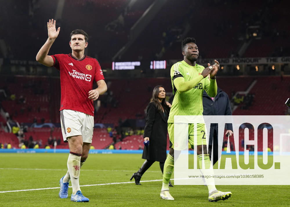 Manchester, England, 24th October 2023. Harry Maguire of Manchester United, ManU and Andrà Onana of Manchester United take the acclaim during the UEFA Champions League match at Old Trafford, Manchester. Picture credit should read: Andrew Yates Sportimage . SPI-2672-0097