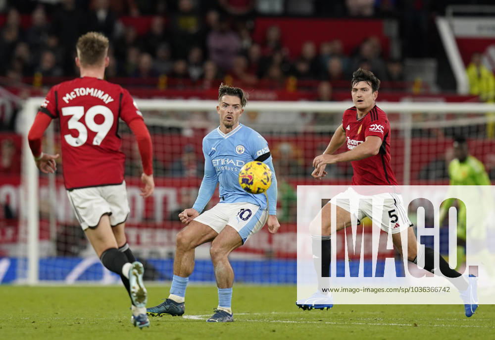 Manchester, England, 29th October 2023. Harry Maguire of Manchester United, ManU chasing after Jack Grealish of Manchester City during the Premier League match at Old Trafford, Manchester. Picture credit should read: Andrew Yates Sportimage . SPI-2690-0057