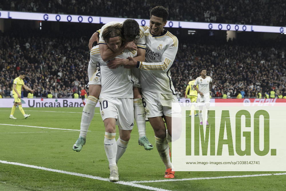 LA LIGA EA Sports - Real Madrid vs Villarreal Luka Modric, Jude Bellingham, and Brahim Diaz of Real Madrid are celebrating a goal during the La Liga 2023 24 match between Real Madrid and Villarreal at Santiago Bernabeu Stadium in Madrid, Spain, on December 17, 2023. Madrid Spain