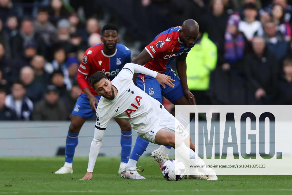 Rodrigo Bentancur of Tottenham Hotspur is challenged by Jean-Philippe Mateta of Crystal Palace during the Premier League match between Tottenham Hotspur and Crystal Palace at Tottenham Hotspur Stadium, London, England on 2 March 2024.
