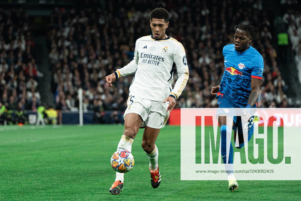 Real Madrid CF v RB Leipzig - Champions League MADRID, SPAIN, MARCH 6: Jude Bellingham of Real Madrid CF and Castello Lukeba of RB Leipzig during the 2st leg Champions League round of 16 match between Real Madrid CF and RB Leipzig at Estadio Santiago Bernabeu on March 06, 2024 in Madrid, Spain. Madrid Santiago Bernabeu Madrid Spain